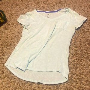 Plain light blue t-shirt with front pocket